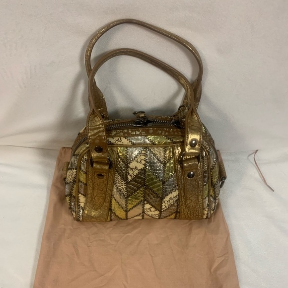 Miu Miu Handbags - Miu Miu 💞Gold Textured Leather Bag